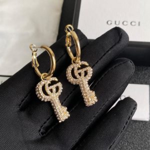 Aretes GG modelo Llave full zirconia